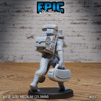 Alligator-folk traveler miniature seen from behind, showing a towering backpack stacked with canisters, pipes, a small trunk, and coiled rope, with exposed scale-textured legs and a satchel at the side. By Epic Miniatures.