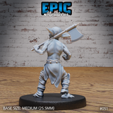 Shirtless goblin barbarian seen from behind, axe raised over the shoulder with both hands gripping the shaft, broad muscular back, baggy trousers and ankle wrappings visible, wide pointed ears prominent. Sculpt by Epic Miniatures.