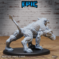 Skinned Cerberus miniature seen from behind, showing exposed corded musculature across haunches and spine, segmented scorpion-like tail arching overhead, clawed hind legs braced wide. Epic Miniatures.