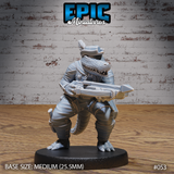 Alligator-folk warrior in a crouching stance, gripping a large crossbow levelled forward with both hands, wearing a long coat, hat, and ankle wrappings with belt pouches. Sculpt by Epic Miniatures.
