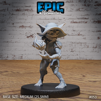Grinning goblin sorcerer in a wide-brimmed hat, one clawed hand raised with swirling magical energy, wearing a shoulder pad and wrapped forearms, smugly posed. By Epic Miniatures.