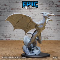 Winged reptilian pterafolk rearing upright on a rocky base, jaws wide open showing rows of teeth, one clawed arm raised high, broad leathery wings fully spread. Sculpt by Epic Miniatures.
