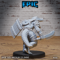 Alligator folk warrior seen from behind and to the side, shield arm extended outward showing full plank-and-rivet detail, serrated blade lowered at the hip, scaled tail visible. Leather strapping across torso. Sculpt by Epic Miniatures.
