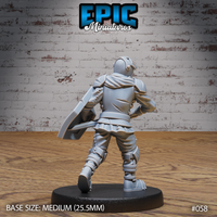Armoured knight viewed from behind, showing a short draped cape over broad pauldrons, articulated back plate with chain links, laced leg armour, and a kite shield held at the left side. Sculpt by Epic Miniatures.