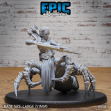 Drider folk archer facing forward with spear levelled in right hand, humanoid upper body merging into a large barbed spider body with eight segmented legs, full arrow quiver on back. Epic Miniatures.