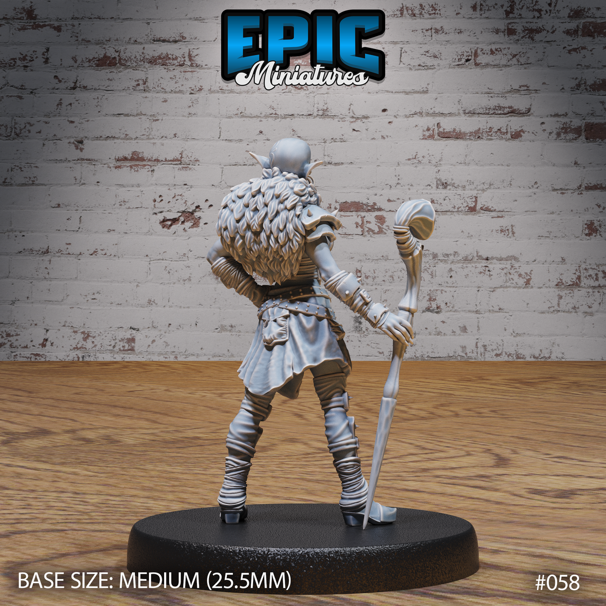 Female hobgoblin from behind, showing a voluminous layered fur cloak covering her back and shoulders, with armour plates visible at the sides and the wrapped base of the skull staff held low. Sculpt by Epic Miniatures.