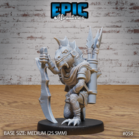 Kneeling lizardfolk warrior gripping a large curved blade in one claw, with a bundle of javelins strapped to its back, dorsal crest fanned, jaws parted, goggles pushed to brow, scale-plate armour and woven cord belt. Sculpt by Epic Miniatures.