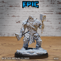 Stocky dwarven warrior holding a spiked warhammer aloft in his right hand and a heavy axe low in his left, wearing full engraved plate armour with skull knee guards and a long braided beard. Sculpt by Epic Miniatures.