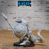 Lizardfolk warrior in a deep forward crouch, holding a broad-tipped spear aloft and gripping a large round embossed shield; studded torso armour, heavily scaled tail sweeping right. Sculpt by Epic Miniatures.