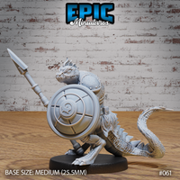 Lizardfolk warrior in a deep forward crouch, holding a broad-tipped spear aloft and gripping a large round embossed shield; studded torso armour, heavily scaled tail sweeping right. Sculpt by Epic Miniatures.