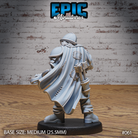 Orc guard seen from behind, showing a billowing cloak with sewn patches, rope bundles and pouches tied at the waist, conical helm visible above. Sculpt by Epic Miniatures.