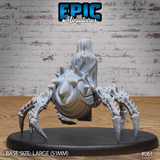 Drider Folk Priestess by Epic Miniatures — rear view showing the heavily textured, spike-covered spider abdomen and the back of long pale hair falling over the figure's shoulders. The eight serrated legs are splayed outward. On a 51mm oval base.