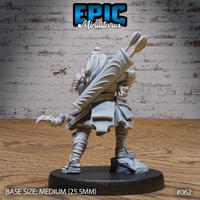 Hobgoblin ranger seen from behind, showing a full quiver of fletched arrows, a belted back-plate, flowing cloak panel, and armoured boots, standing on a rocky scenic base. Sculpt by Epic Miniatures.