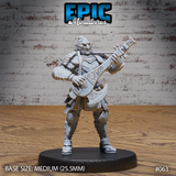 Armoured hobgoblin bard standing wide-legged, playing an ornate axe-shaped lute with scrollwork detailing, wearing articulated plate, layered armour skirts, and a fur pauldron. Sculpt by Epic Miniatures.