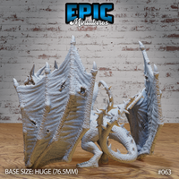 Rear view of a three-headed wyvern miniature showing the full span of two large textured wings with torn membrane detail, spiked ridges, and a coiling tail. Sculpt by Epic Miniatures.