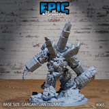 Clockwork death golem sculpt viewed from behind and above, showing ornate clocktower spires, carved stonework scrollwork, and thick brick-slab forearms raised outward. Shattered stone base. By Epic Miniatures.