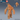 Digital render of an unpainted resin Yeti miniature by Epic Miniatures — a large horned, fur-covered bipedal creature with a snarling expression, muscular build, and clawed hands, shown from the front alongside a rear view and a d20 for scale reference