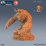 Unpainted orange resin large yeti miniature from Epic Miniatures, shown in a slightly different three-quarter angle without the small painted comparison figure. The thick fur texture, curved horns, snarling teeth, wide hands, and iron wrist shackles are clearly visible. The integrated rocky base grounds the pose as the creature lurches forward.