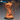 Unpainted orange resin miniature of a Young Remorhaz by Epic Miniatures — a multi-limbed insectoid creature rearing upright on a rocky base, with a broad fan-like frill framing its open-mouthed head, curling barbed horns, segmented armoured body, and multiple splayed legs. Digital render shown from a front-angle perspective with a ghosted close-up of the face visible in the background.