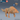 Digital render of an unpainted Winter Wolf miniature by Epic Miniatures — large-sized beast in a stalking pose with head lowered and jaws open in a snarl, covered in deeply layered overlapping fur texture across the mane, haunches, and shoulders; a size-comparison miniature and blue d20 are visible in the upper right corner