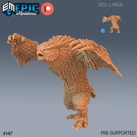 Digital render of an unpainted resin owlbear miniature in a large-scale hug attack pose — one taloned foreleg extended forward mid-strike, wings spread wide, beak open and head lowered in threat display, with detailed individual feather sculpting across the chest, wings, and haunches; a scale reference die and small size-comparison inset are visible in the top right corner