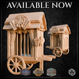 Promotional render showing two size variants of the Caged Circus Cart side by side — a larger version in the foreground and a smaller compact version behind — both in unpainted warm beige, highlighting the ornate carved detailing, draped curtains, hanging lantern, and spoked wheels with shell hub motifs