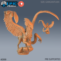 Gargantuan angelic dragon rearing on a rocky base, wings fully spread with finely detailed feathers, long curving tail overhead. A small winged celestial figure stands nearby. Sculpt by Epic Miniatures.