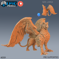 Griffin miniature by Epic Miniatures — lion body with splayed taloned forefeet, eagle head open-beaked in a cry, broad feathered wings arched wide in a threat display, long lion tail sweeping behind.