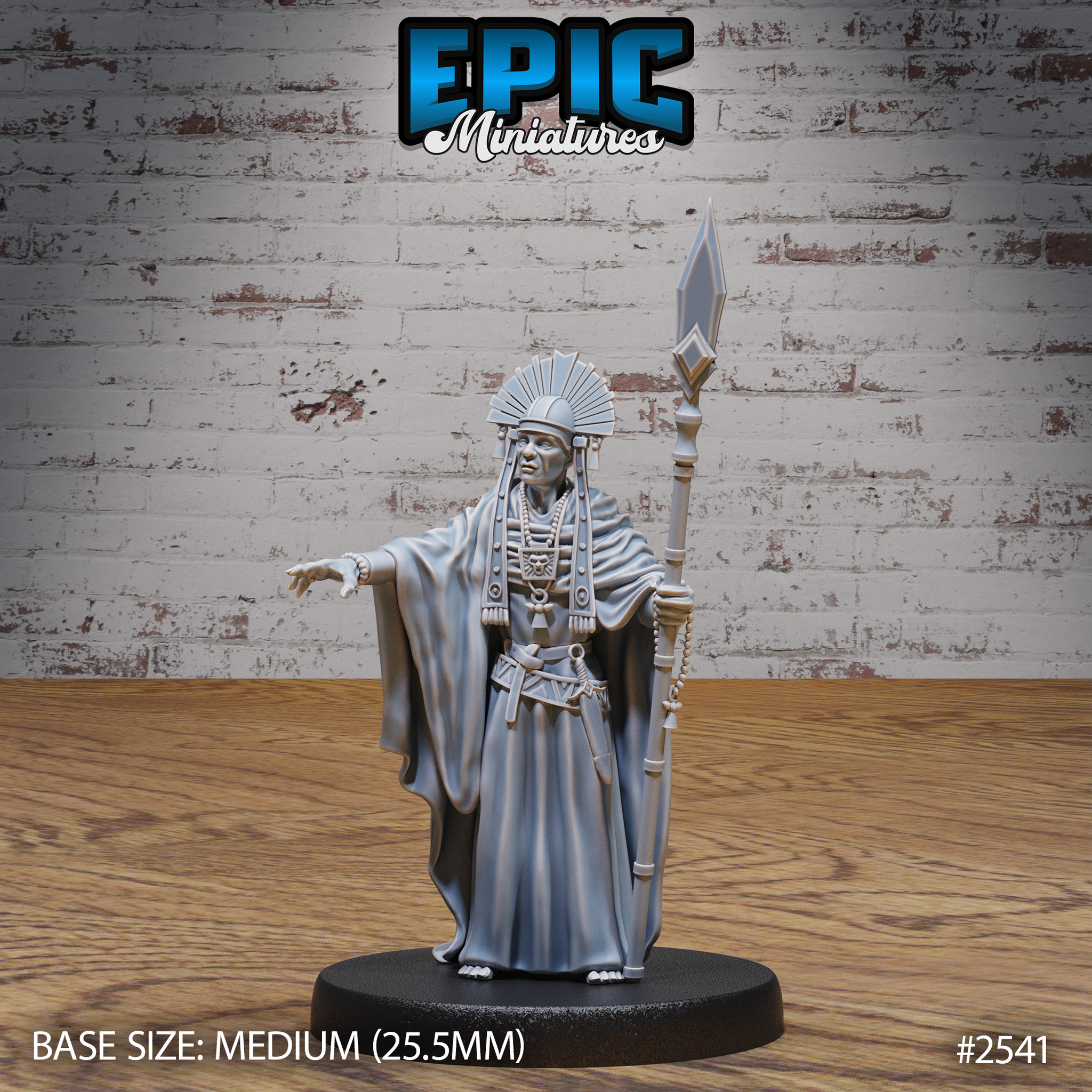 Robed elder male figure holding a tall beaded spear with diamond tip in one hand, opposite arm extended outward with fingers spread. Wears a fanned radial headdress, layered bead necklaces, and flowing ceremonial robes. Weathered, deeply lined face with a commanding expression. Sculpt by Epic Miniatures.