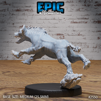 Savage hyena miniature in a low charging pose, head thrust forward with mouth agape showing teeth, spined dorsal ridge raised, powerful haunches driving the beast onward. Rocky sculpted base beneath. By Epic Miniatures.