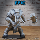 Elephant-headed warrior in heavy armour, lunging forward with a spiked mace in the left hand and an ornate engraved warhammer raised in the right. Sculpt by Epic Miniatures.