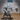 Elephant-headed warrior in heavy armour, lunging forward with a spiked mace in the left hand and an ornate engraved warhammer raised in the right. Sculpt by Epic Miniatures.