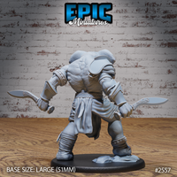 Elephant-headed humanoid barbarian seen from behind, showing broad wrinkled shoulders, shoulder armour, wrapped bracers, a fabric belt, and two ornately detailed curved blades held wide. Sculpt by Epic Miniatures.