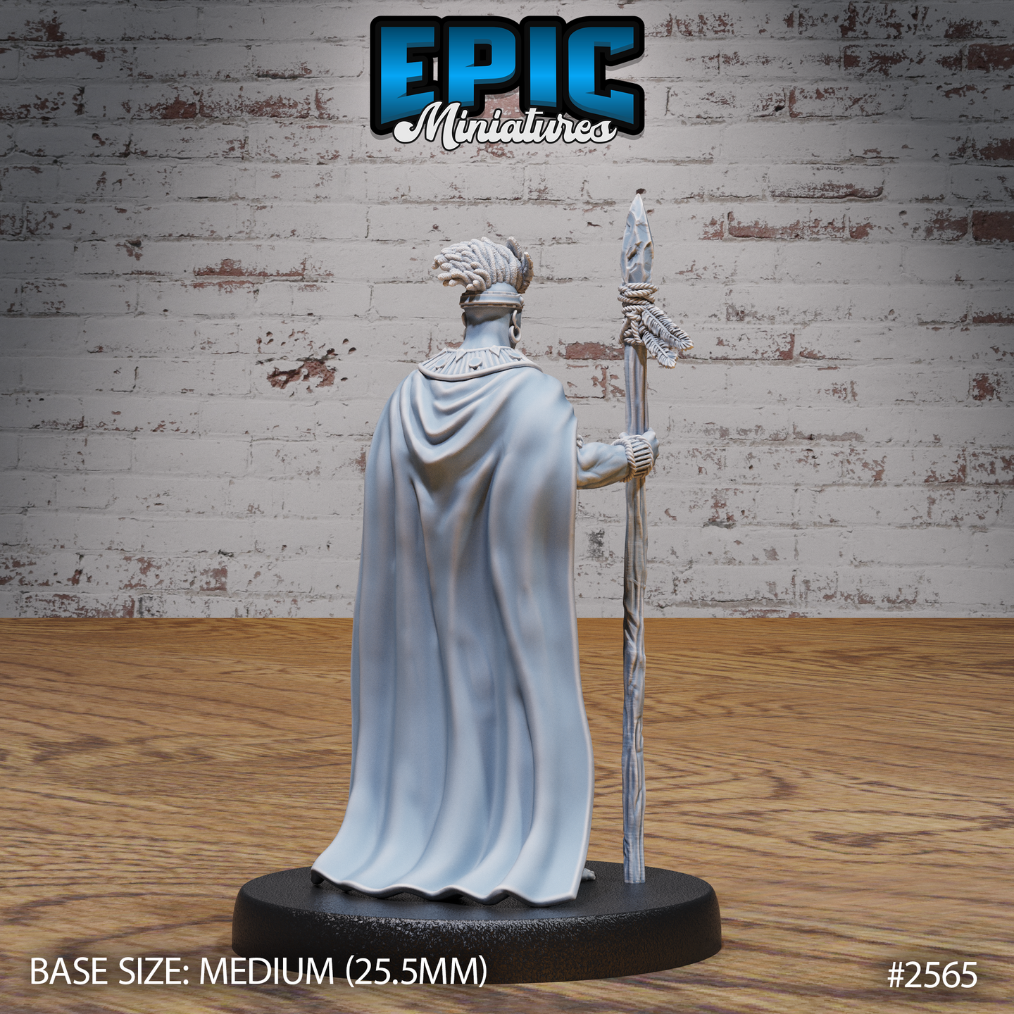 Tribal warrior from behind, broad flowing cape dominating the view, rope-bound dreadlocked hair rising to a feathered headdress, tall ceremonial spear held loosely at his right side with cord and feather bindings visible. Sculpt by Epic Miniatures.