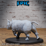 Rhinoceros miniature by Epic Miniatures viewed from behind and to the side, showing the heavily textured wrinkled hide across the broad back and haunches, tail raised, on a large oval base.