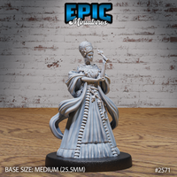Regal female figure in a floor-length gown patterned with carved bones, wearing a feathered collar and holding a serpent-topped staff. Skull charms hang from her waist chain. Sculpt by Epic Miniatures.