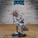 Voodoo Priest Mage miniature by Epic Miniatures, a tall lean figure in skull mask with feathered headdress, raising a large swirling spirit totem staff in his left hand, wearing carved bone armour, fur-trimmed greaves and a flowing tattered cape, standing on a rocky sculpted base.