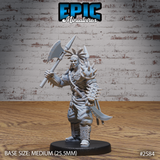 Broad-shouldered tribal warrior gripping a large axe raised across his chest, wearing spiked bone armour, feathered headdress, and carved boot wrappings, with javelins and a curved blade strapped to his back. Sculpt by Epic Miniatures.