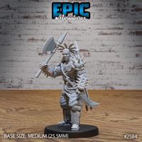 Broad-shouldered tribal warrior gripping a large axe raised across his chest, wearing spiked bone armour, feathered headdress, and carved boot wrappings, with javelins and a curved blade strapped to his back. Sculpt by Epic Miniatures.