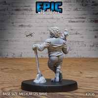 Halfling villager miniature seen from behind, shovel gripped in one hand, opposite arm raised with a curled fist, wearing a fitted waistcoat with fabric tension across the back, curly hair detailed at the crown. Sculpt by Epic Miniatures.
