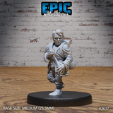 Halfling miniature mid-stride with one knee raised, wearing a layered travel coat, carrying a bedroll and pack. Tousled hair, focused expression, bare hairy feet. Sculpt by Epic Miniatures.