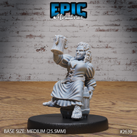 Halfling barmaid holding a frothing wooden tankard aloft with one hand, wearing a ruffled blouse with laced ties, layered skirts, and a rope belt, with curly hair and a broad grin. Sculpt by Epic Miniatures.