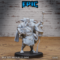 Stocky bearded merchant standing upright, holding a lantern staff in one hand and a tome under his arm, with a tentacle detail at his hip and fur-trimmed layered robes. Sculpt by Epic Miniatures.