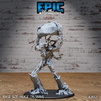 Angry treant miniature striding forward, hoisting a large boulder overhead with both branch-arms, gnarled bark body with expressive face, root-like feet on a large oval base. By Epic Miniatures.