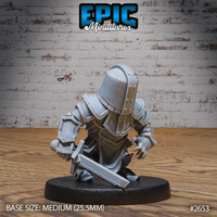 Stocky halfling in heavily dented plate armour crouching into a low guard, holding a broad short sword angled downward across the body, free hand clenched at side. Sculpt by Epic Miniatures.