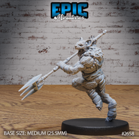 Snarling gnoll mid-leap, clutching a long polearm with a three-pronged tip, wearing wrapped shin and forearm armour with bone-stud shoulder decoration. Heavy matted fur covers the chest and thighs. Sculpt by Epic Miniatures.
