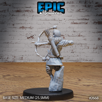 Halfling ranger miniature seen from behind, showing a full arrow quiver, wrapped arm bindings, layered coat, and composite bow drawn at the side. Sculpt by Epic Miniatures.