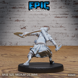 Halfling skin changer seen from behind, forked blade weapon thrust outward, dagger in trailing hand, clawed feet planted in fighting stance, layered fur cloak and packed belt visible. Sculpt by Epic Miniatures.