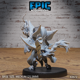 Cat folk druid seen from behind, showing dramatic billowing cloak, scroll-worked hat brim, and a staff wreathed in wild flame held aloft, clawed fingers outstretched at the side. Sculpt by Epic Miniatures.
