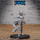 Foxfolk female warrior standing upright, gripping a rune-etched crossbow at her side, a barbed anchor sword at her feet. Plate armour with circular knee runes, billowing cape, large pointed fox ears. Sculpt by Epic Miniatures.